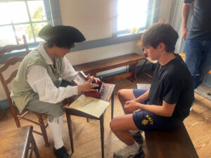 Two boys play a game.