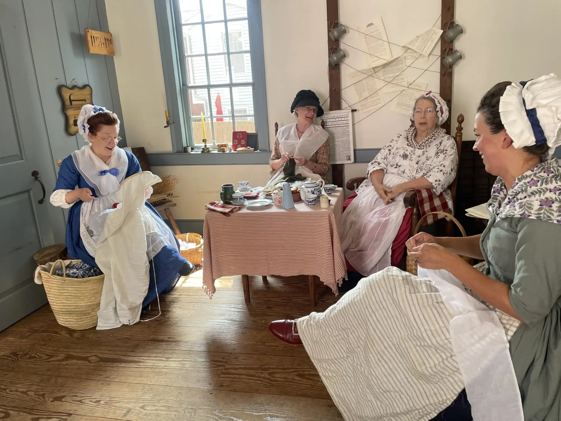 A photo of living historians depicting camp followers during the Revolutionary War