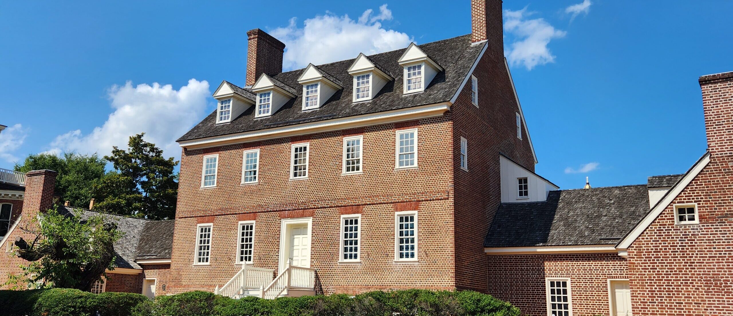 Exterior view of the William Paca House, a restored 18th-century Georgian mansion in Annapolis, Maryland, showcasing colonial architecture and historic preservation.