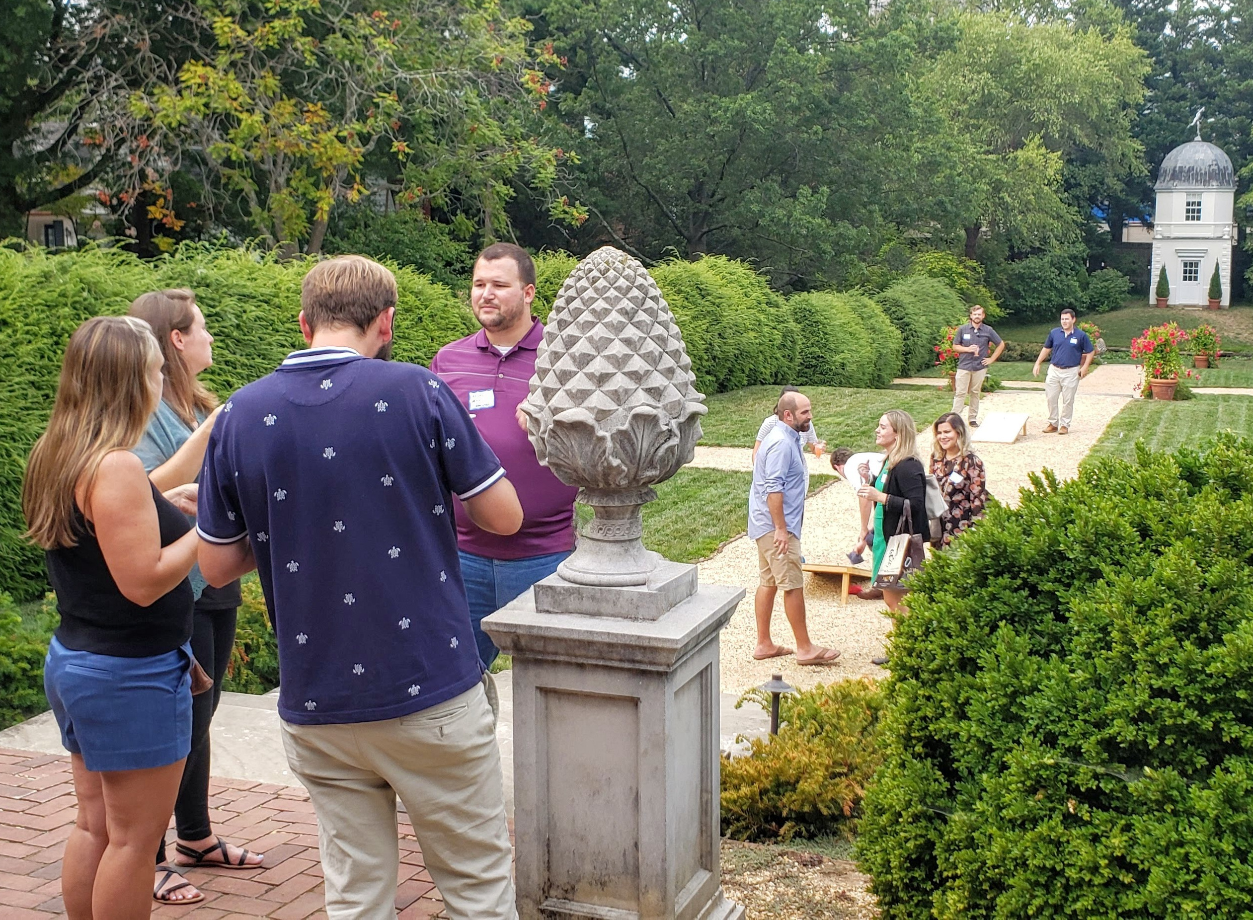 Young professionals in the William Paca Garden