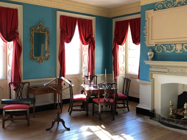 Elegant colonial dining room at the William Paca House in Annapolis, furnished with period décor for historic tours and special events.